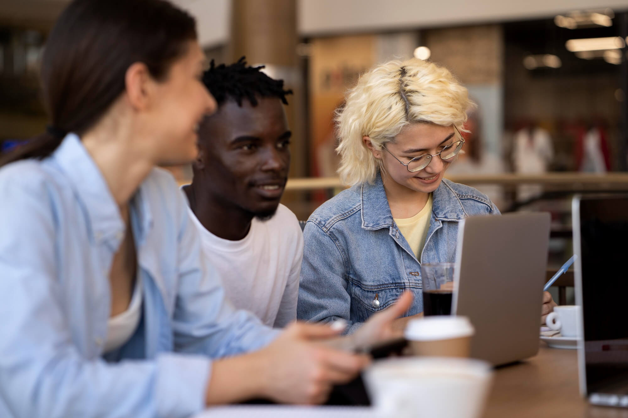 Young adults meeting up to study.        