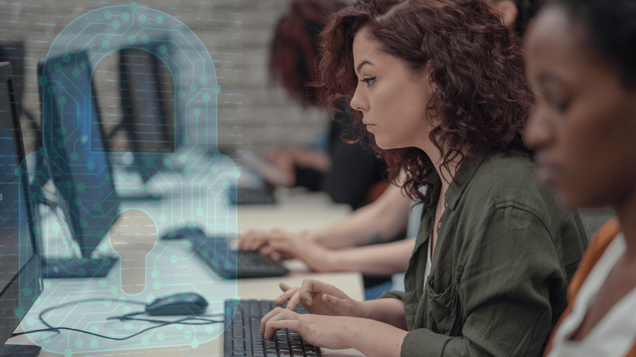 A group of students working on computers in a library.