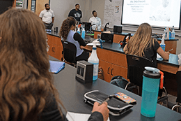 A group of students in a classroom.