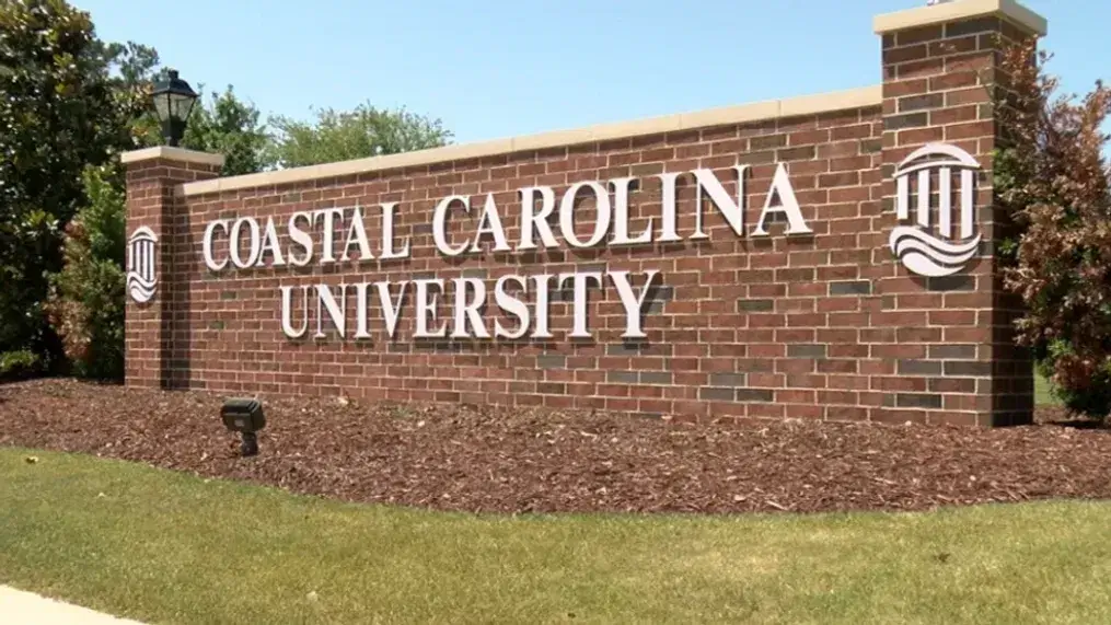 Coastal Carolina University logo on the wall.